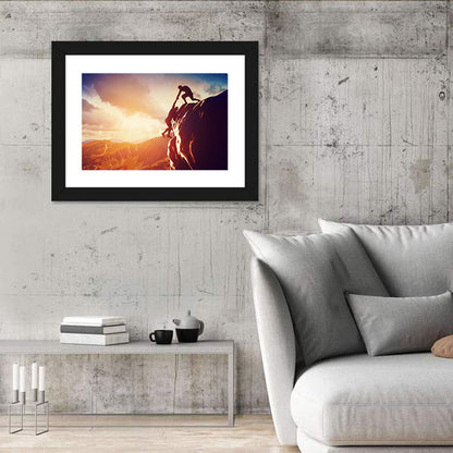Two Hikers Summit Assist at Sunset Wall Art