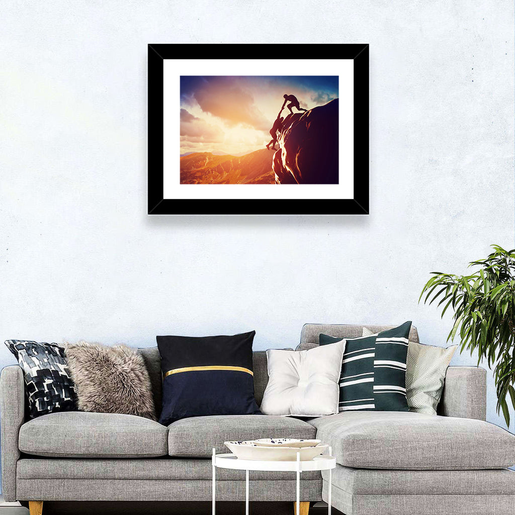 Two Hikers Summit Assist at Sunset Wall Art