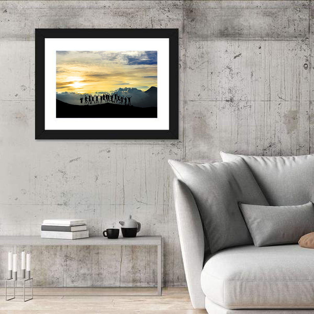 Golden Team Silhouettes at Sunset Wall Art in a room, landscape