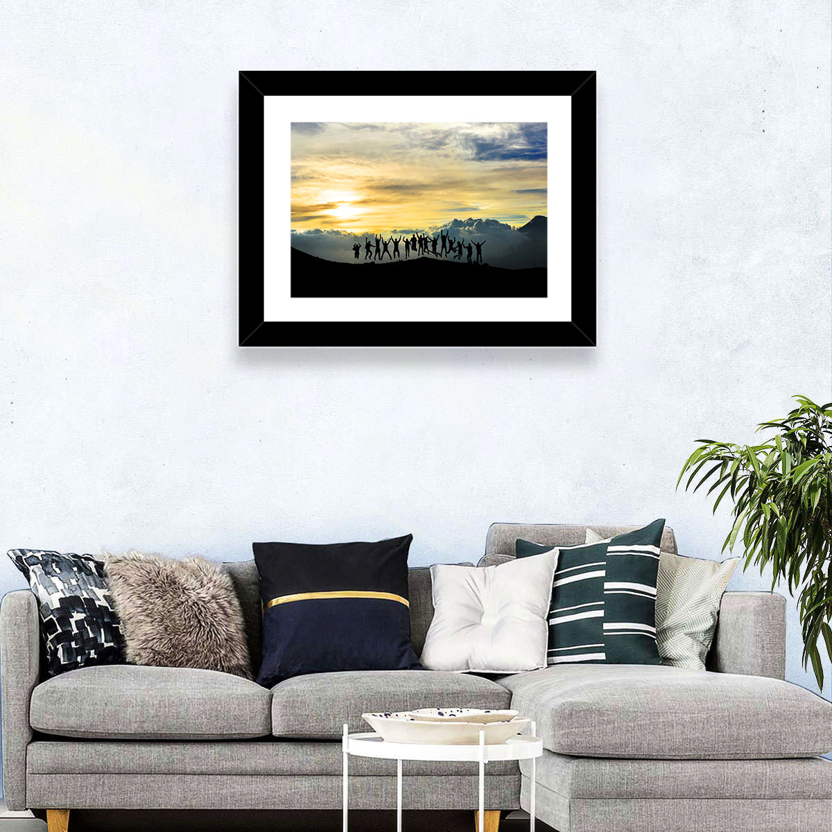 Golden Team Silhouettes at Sunset Wall Art in a room, landscape