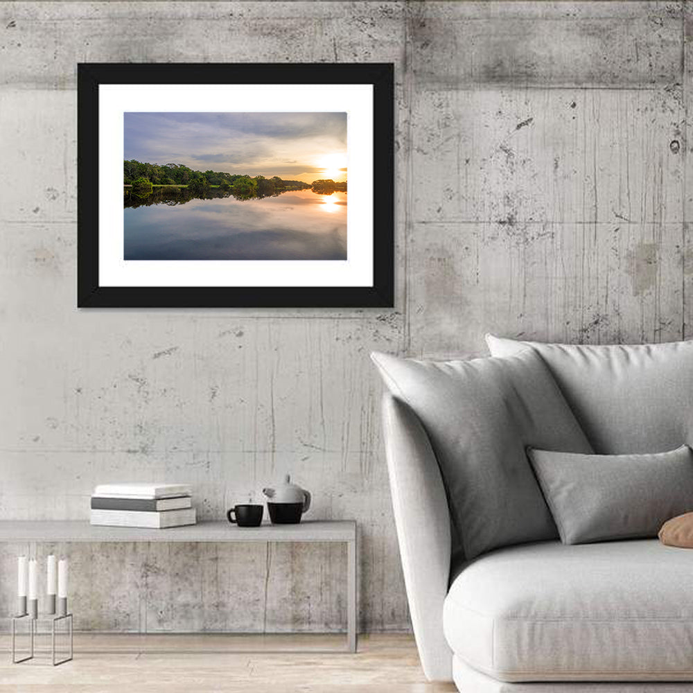 Amazon River Sunset Reflection Wall Art in a room, landscape