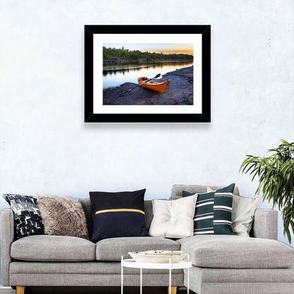 Orange Kayak on Rocky Shore Wall Art