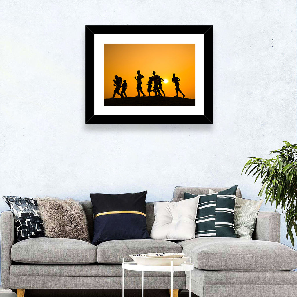 Six Runners Silhouette at Golden Sunset Wall Art