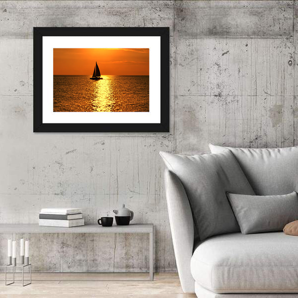 Sailboat Silhouette at Golden Sunset Wall Art