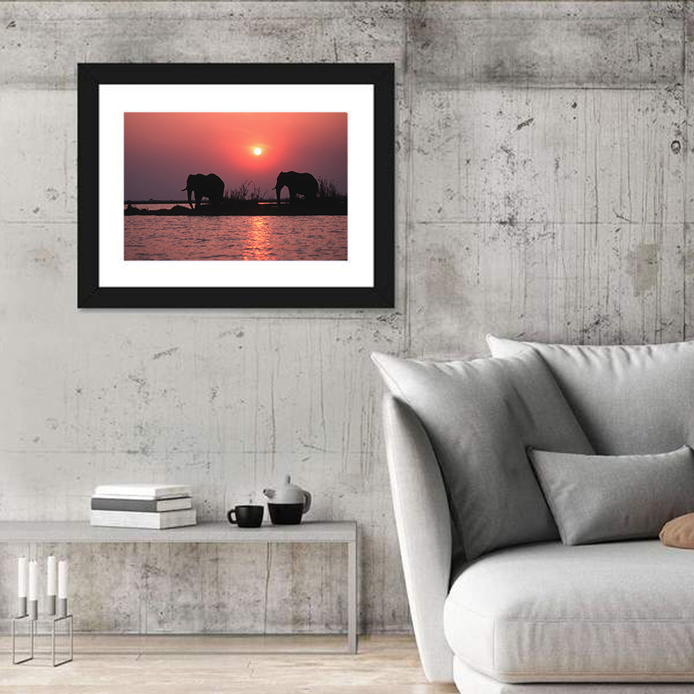 Elephants at Sunset Silhouette Wall Art in a room, landscape
