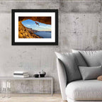 Climber on Overhanging Coastal Rock Wall Art