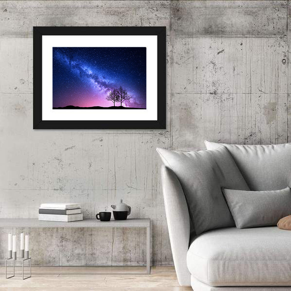 Milky Way Nebula Sky with Silhouetted Trees Wall Art in a room, landscape