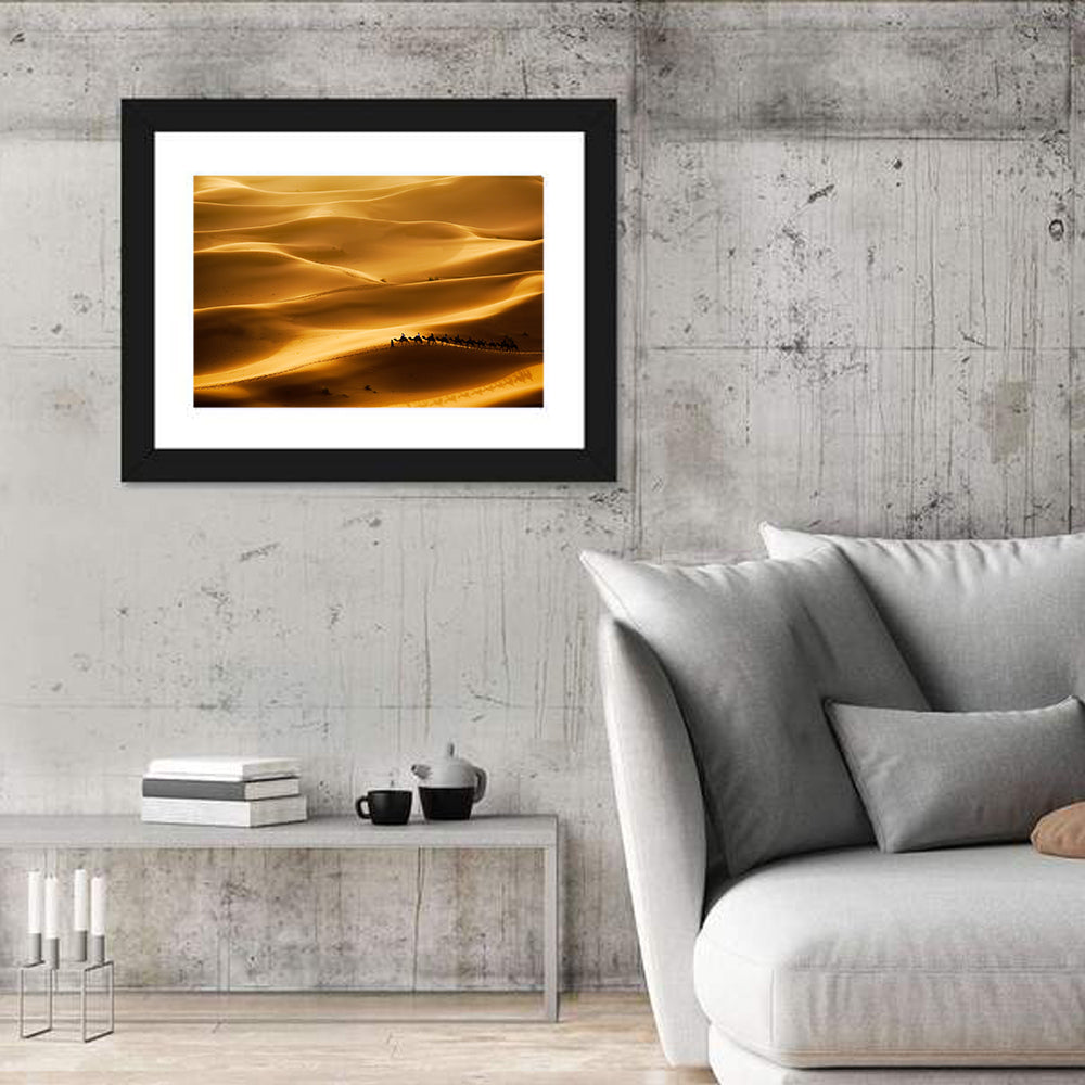 Golden Hour Camel Caravan Wall Art in a room, landscape