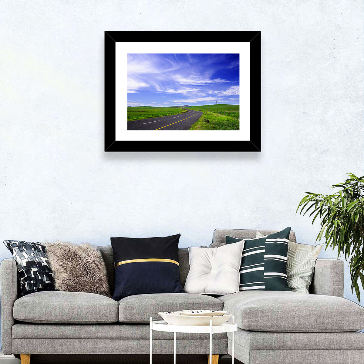 Winding Country Road in Green Fields Wall Art in a room, landscape