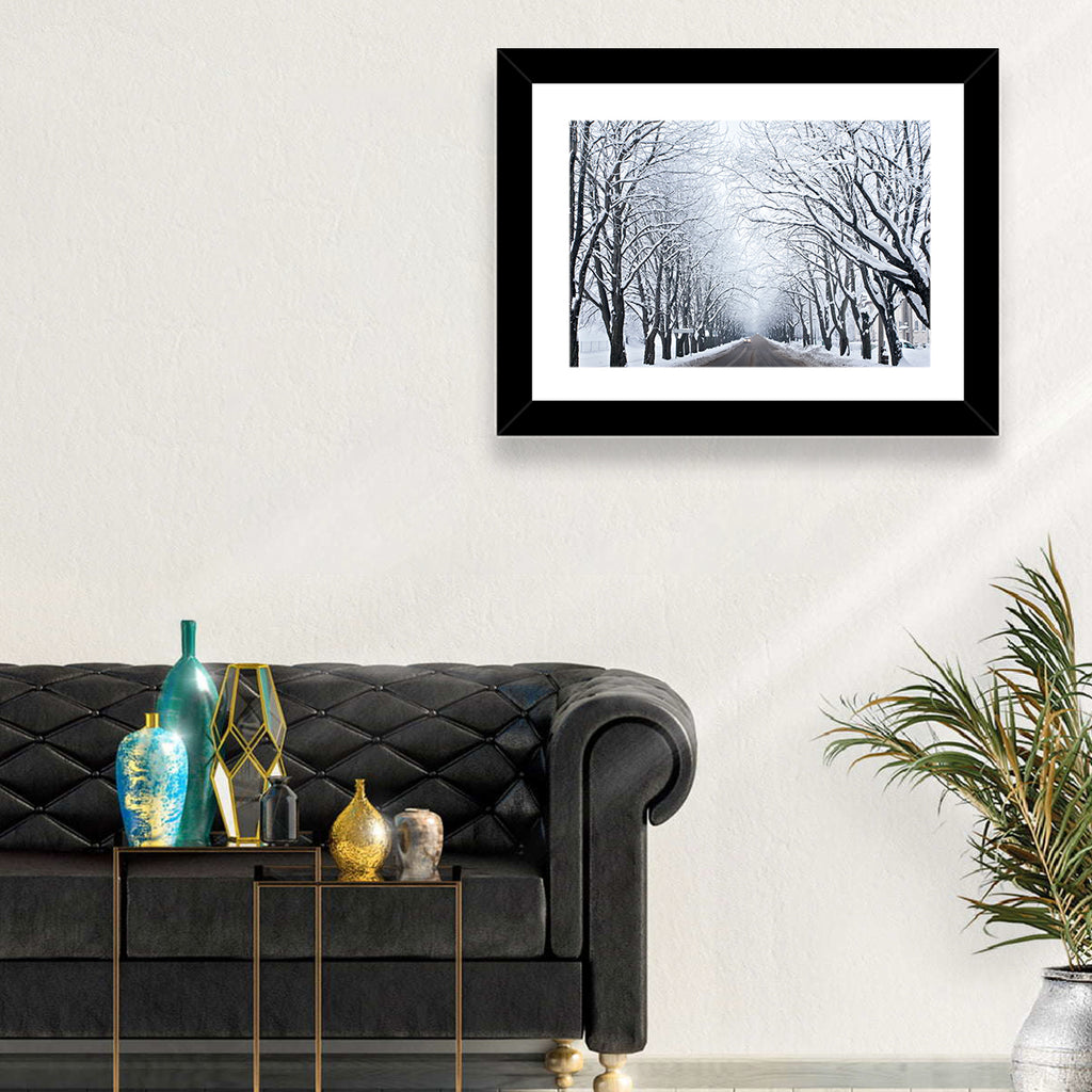 Snowy Road with Distant Headlights Wall Art