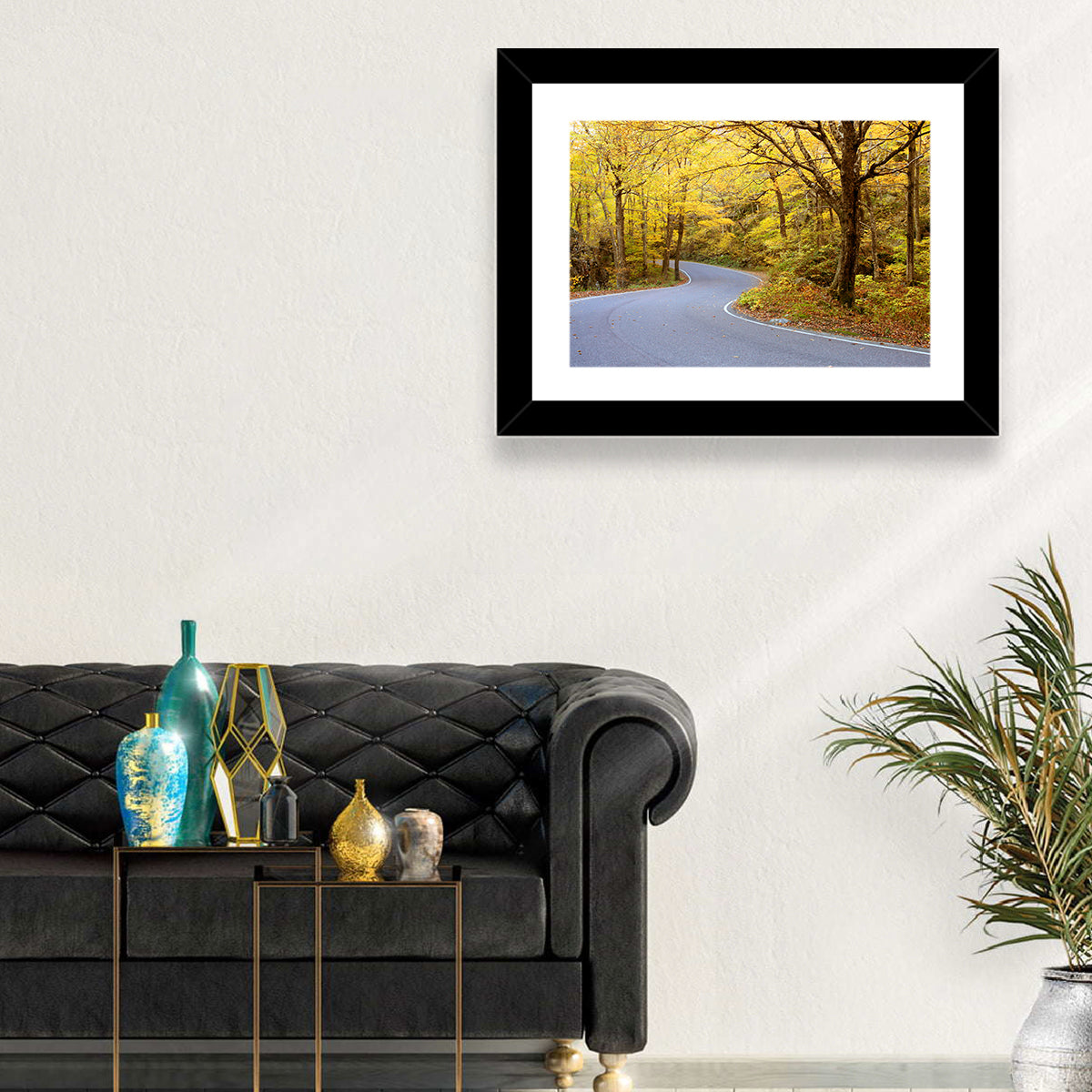 Winding Road Through Autumn Foliage Wall Art in a room, landscape