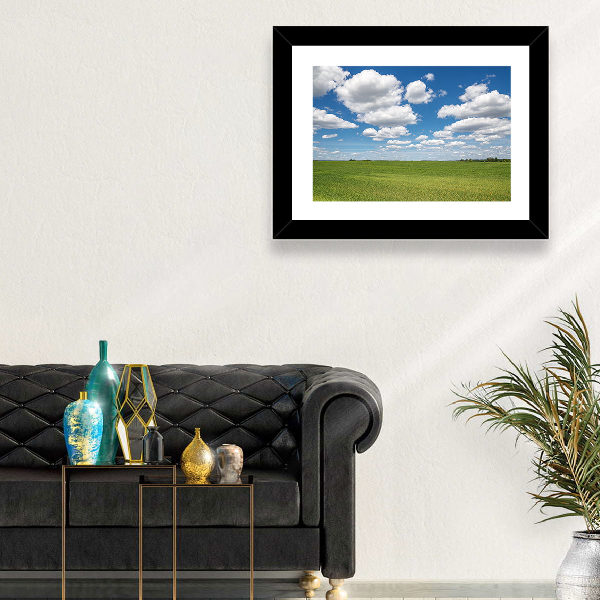 Cloud Filled Sky Over Meadow Wall Art in a room, landscape