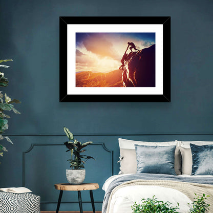 Two Hikers Summit Assist at Sunset Wall Art