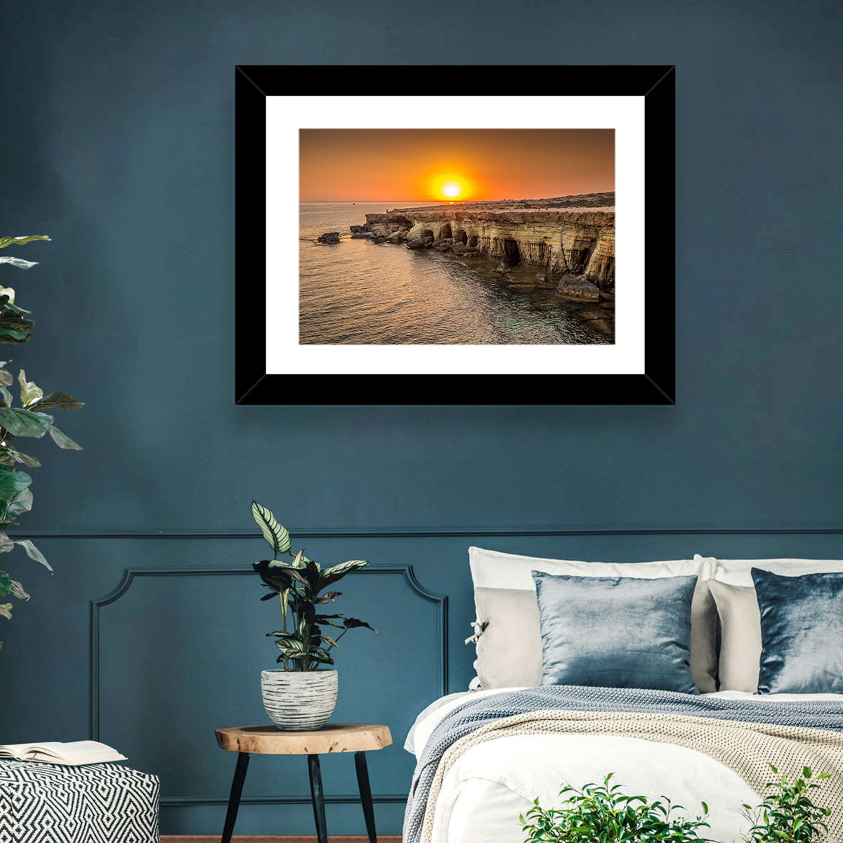 Sunset Over Sea Caves Wall Art in a room, landscape