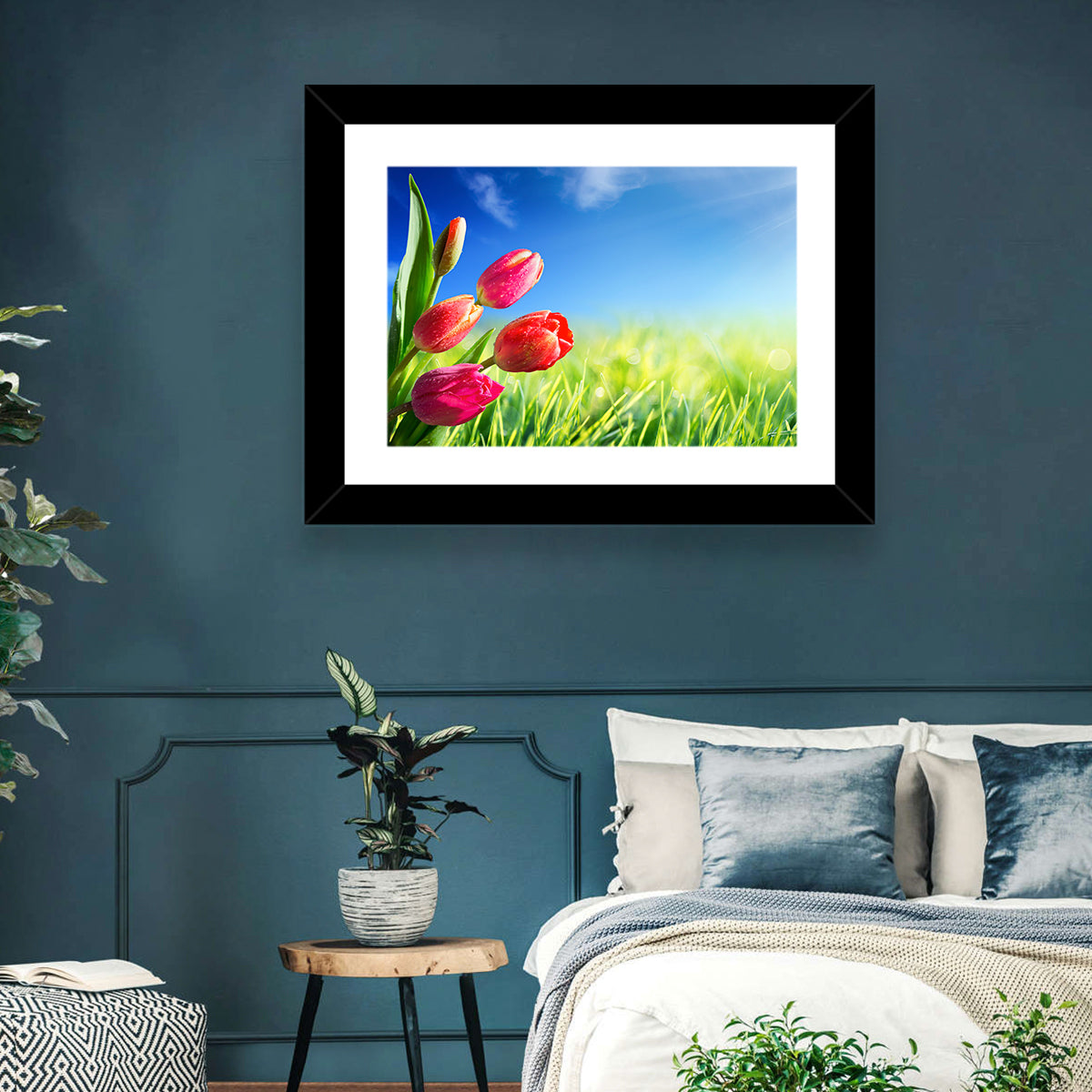 Dewy Red Tulips Under Blue Sky Wall Art in a room, landscape