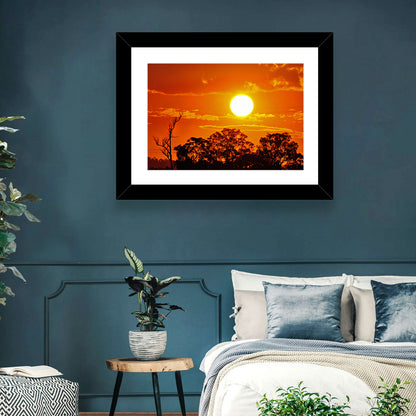Burning Sun Over Tree Silhouettes Wall Art