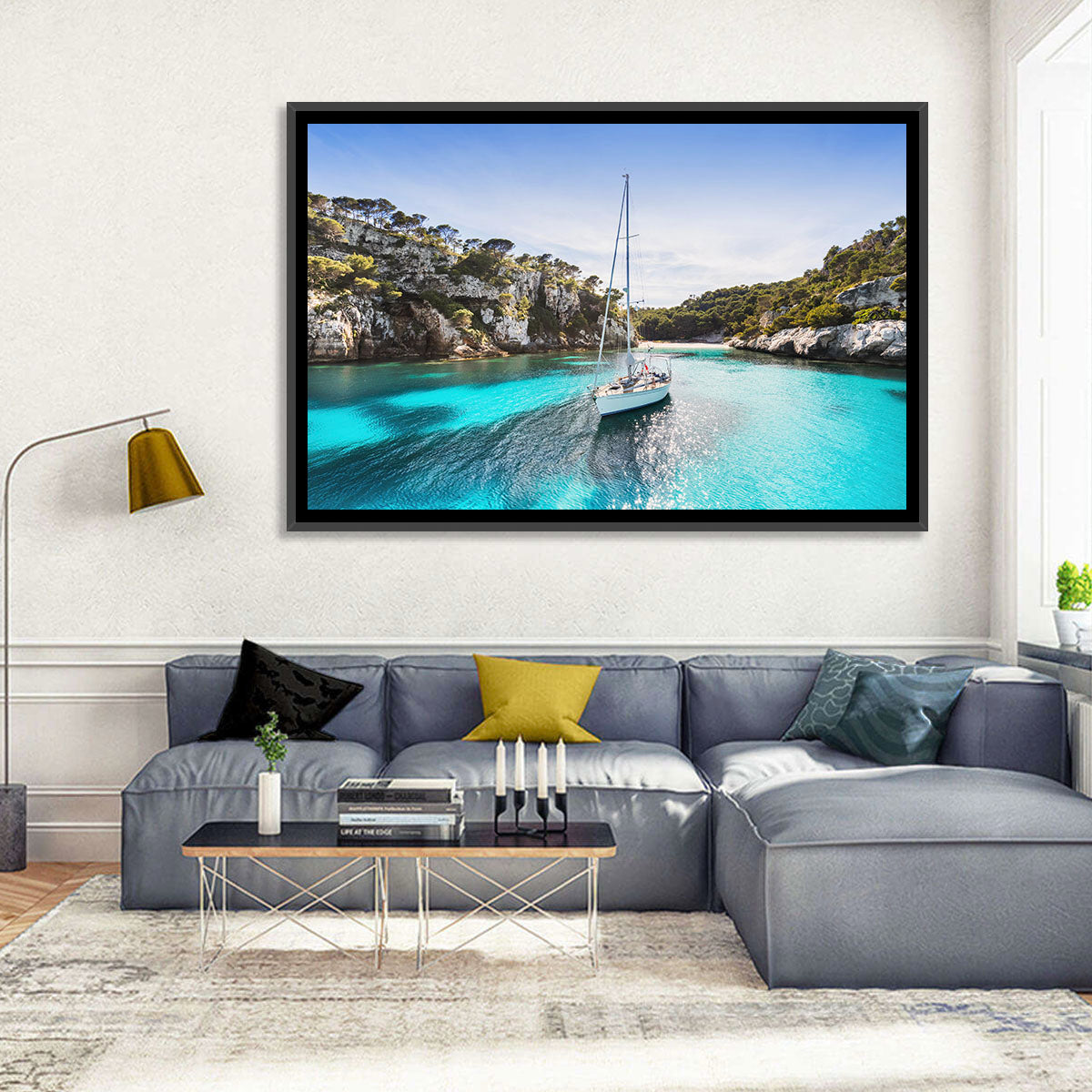 Menorca Cove Sailboat Wall Art in a room, landscape
