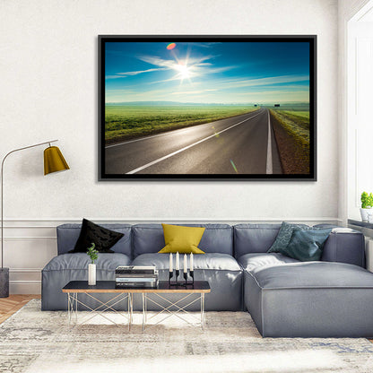 Sunlit Road Through Green Field Wall Art