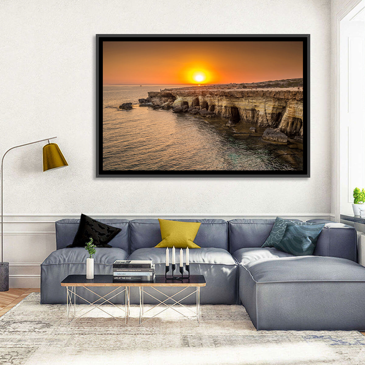 Sunset Over Sea Caves Wall Art in a room, landscape