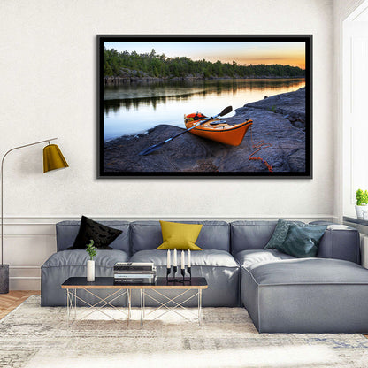 Orange Kayak on Rocky Shore Wall Art