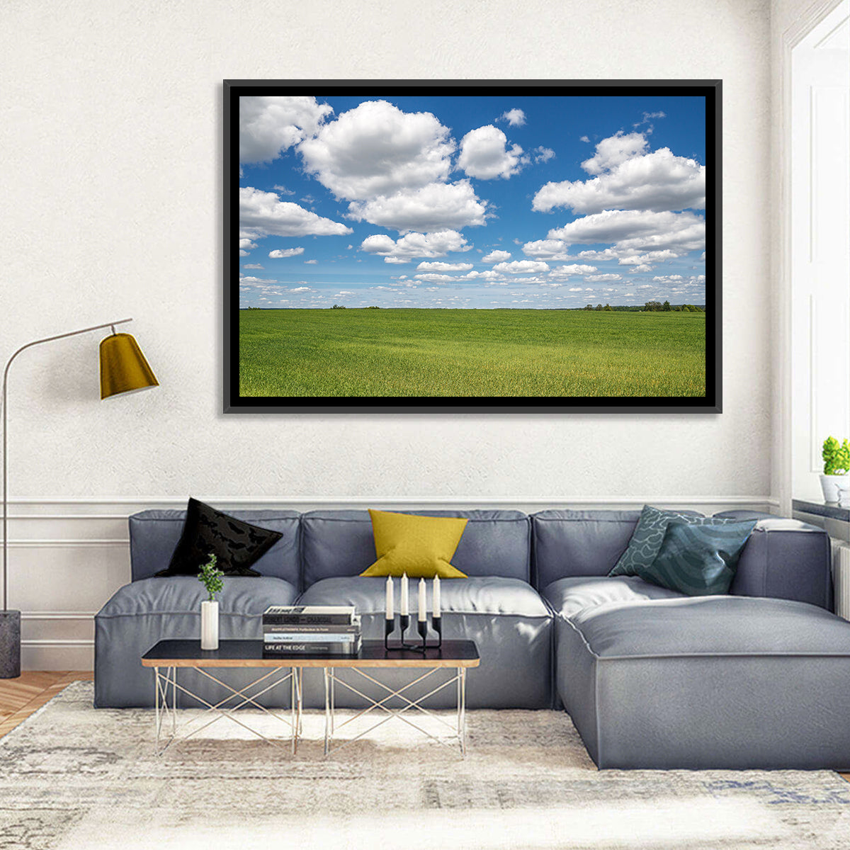 Cloud Filled Sky Over Meadow Wall Art in a room, landscape