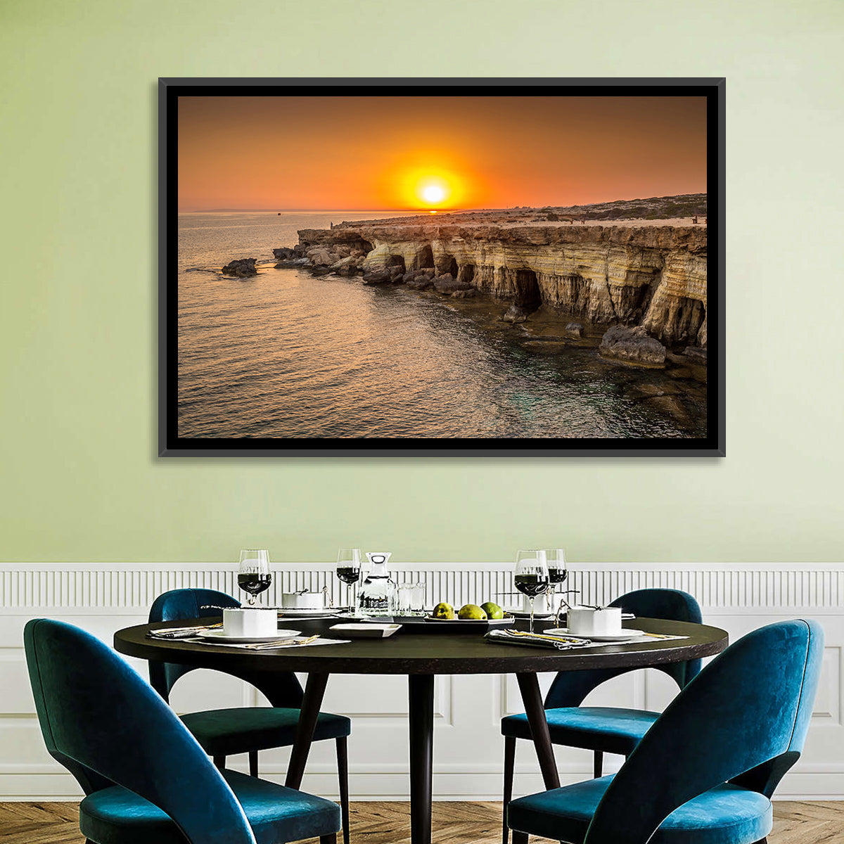 Sunset Over Sea Caves Wall Art in a room, landscape
