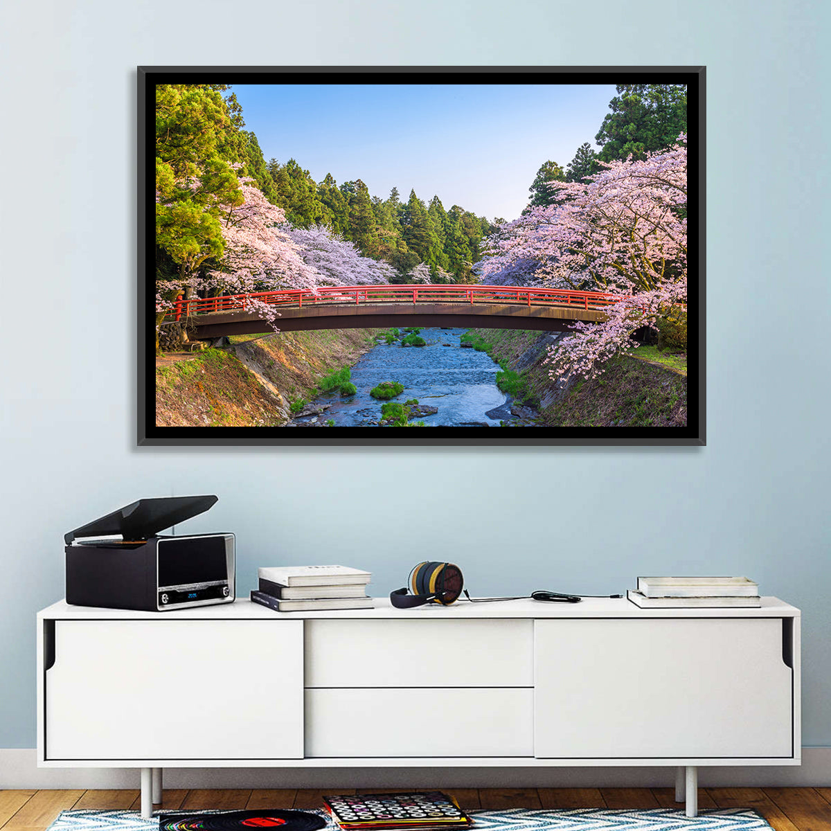 Arched Red Bridge with Cherry Blossoms Wall Art in a room, landscape