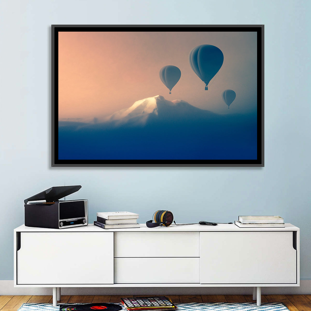 Three Hot Air Balloons Over Misty Peak Wall Art in a room, landscape