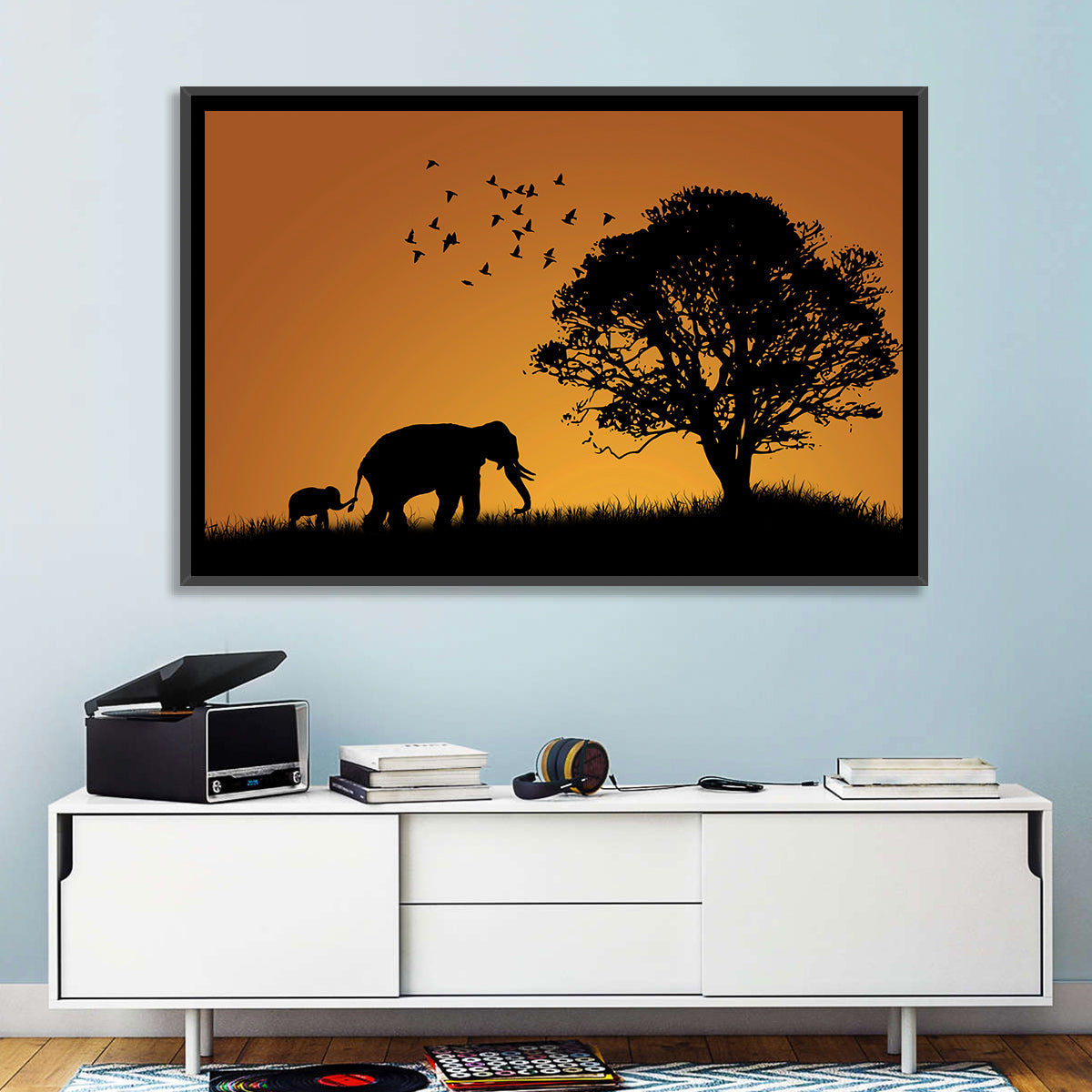 Elephant Family at Golden Sunset Wall Art in a room, landscape
