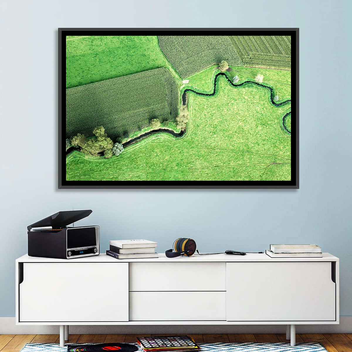 Meandering Stream Over Farmland Wall Art in a room, landscape