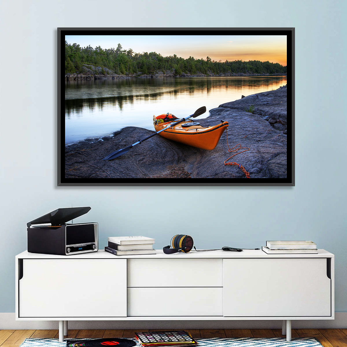 Orange Kayak on Rocky Shore Wall Art
