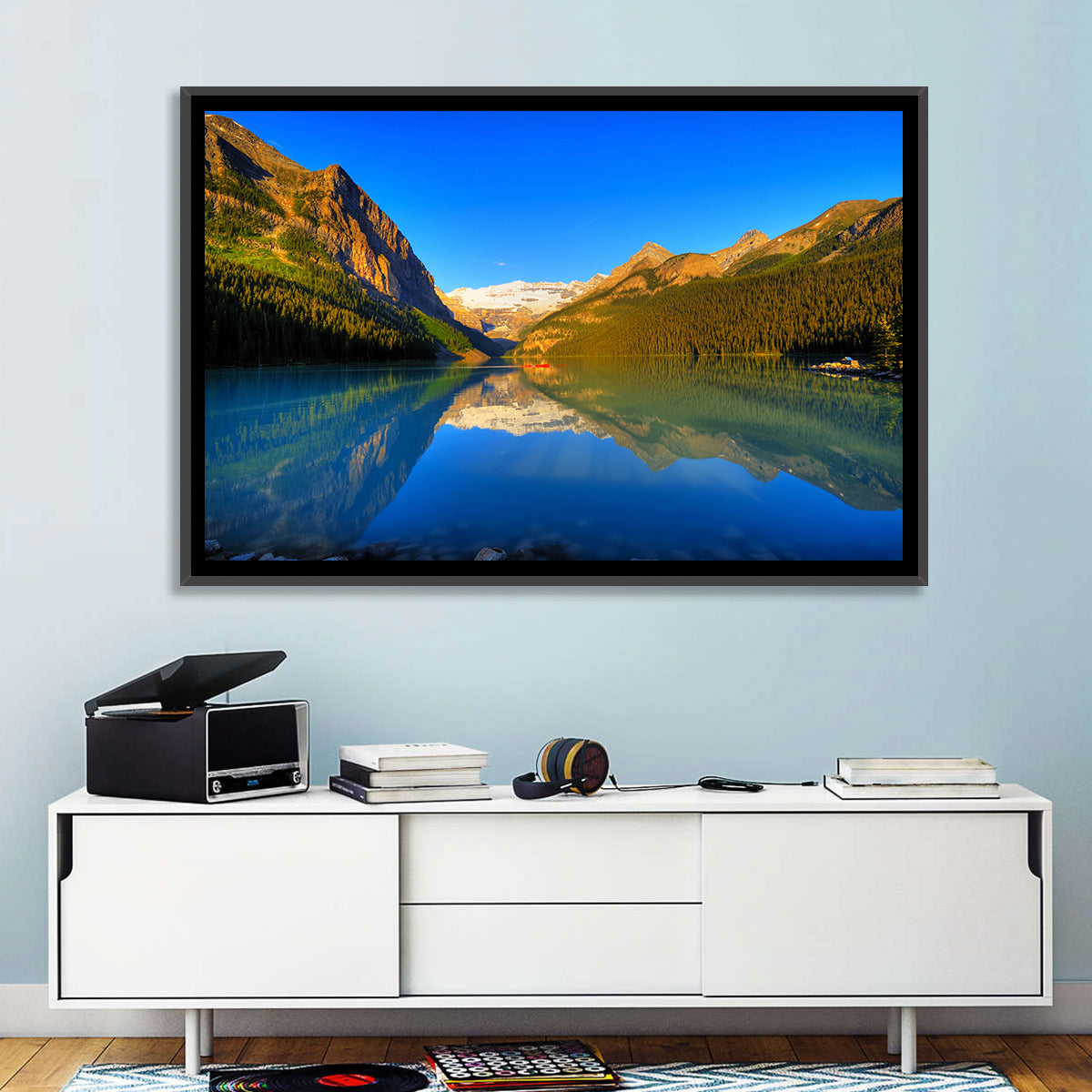 Lake Louise Canoe Reflection Wall Art in a room, landscape
