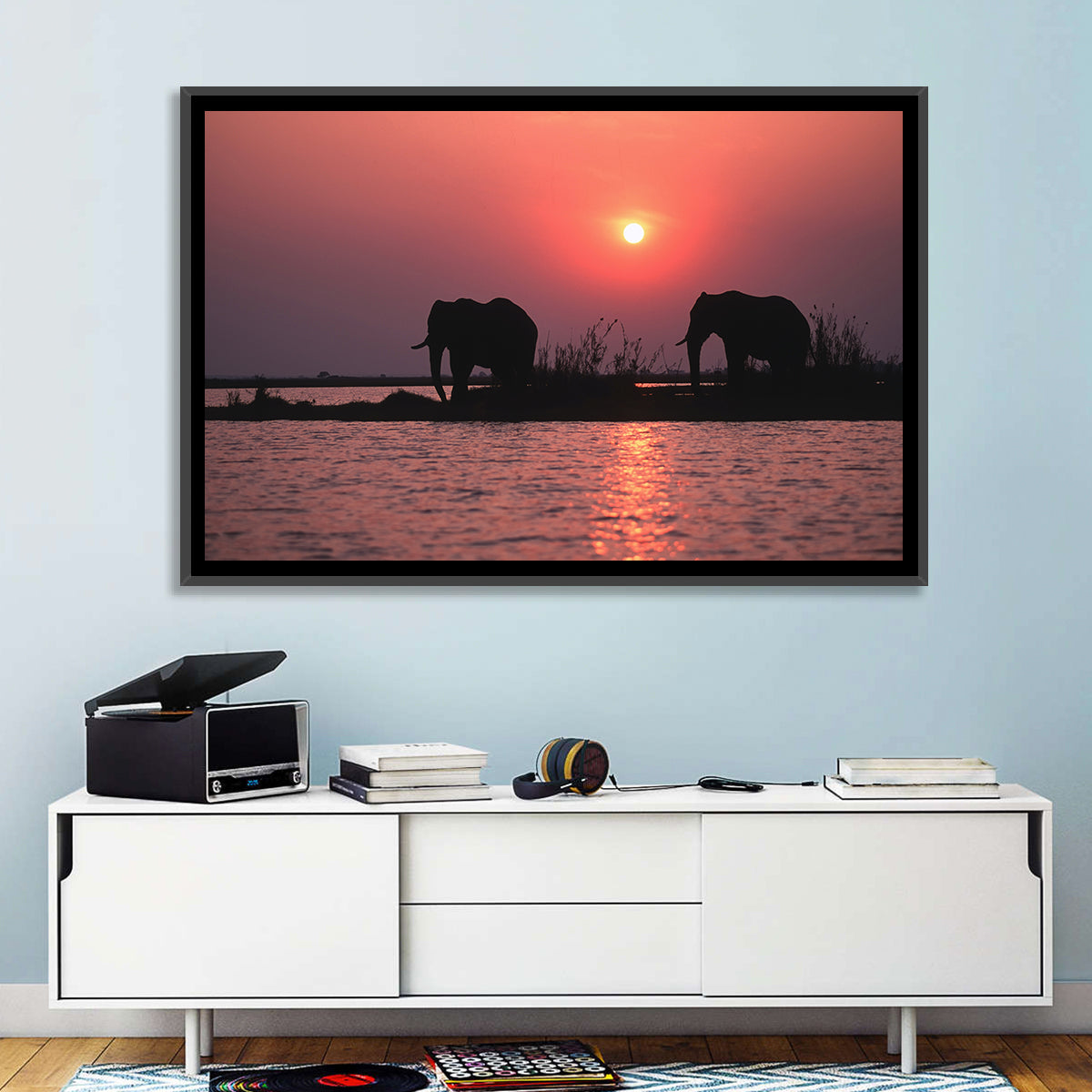 Elephants at Sunset Silhouette Wall Art in a room, landscape