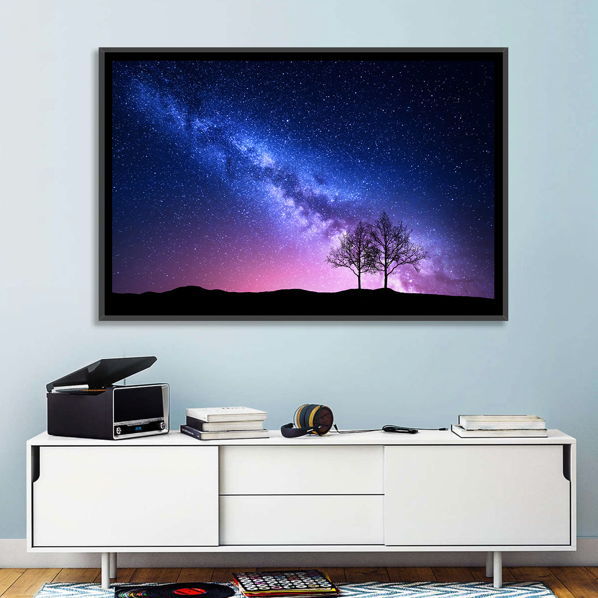 Milky Way Nebula Sky with Silhouetted Trees Wall Art in a room, landscape