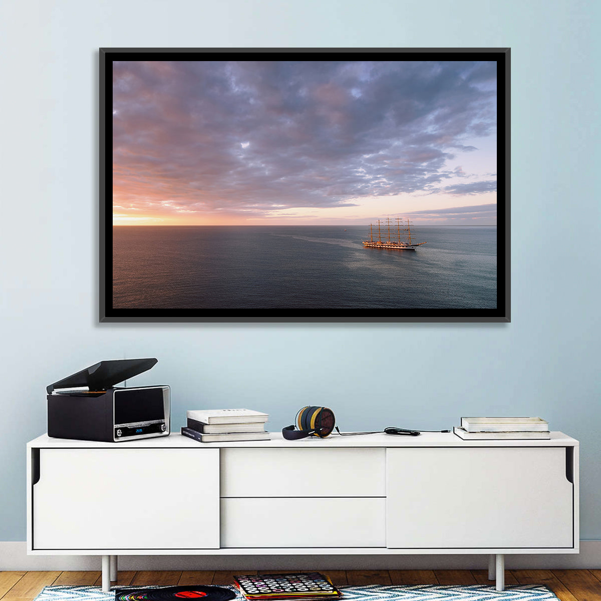Sunlit Tall Ship at Sea Wall Art in a room, landscape