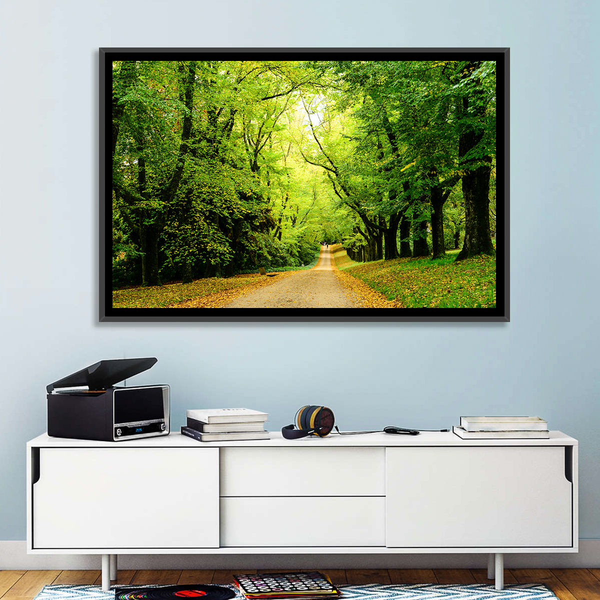 Sunlit Forest Pathway Wall Art in a room, landscape