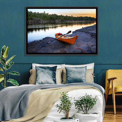 Orange Kayak on Rocky Shore Wall Art