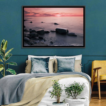 Pink Dusk Lakeshore with Silhouetted Rocks Wall Art
