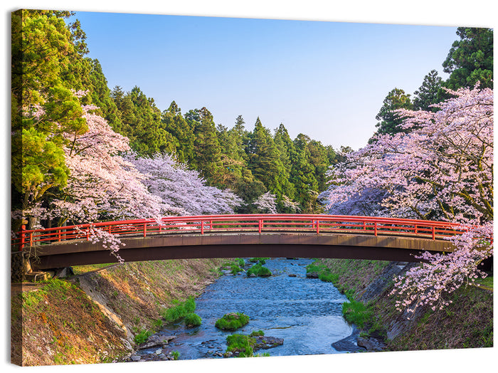 Arched Red Bridge with Cherry Blossoms Wall Art as a canvas print