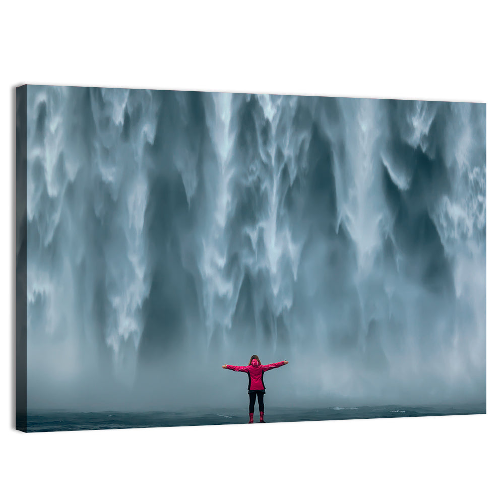 Skogafoss Waterfall with Figure in Pink Wall Art