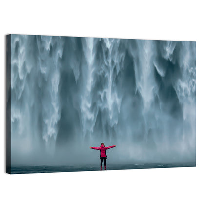 Skogafoss Waterfall with Figure in Pink Wall Art