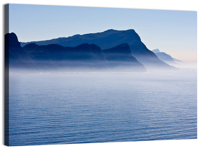 Misty Coastal Cliffs and Mountain Layers Wall Art as a canvas print