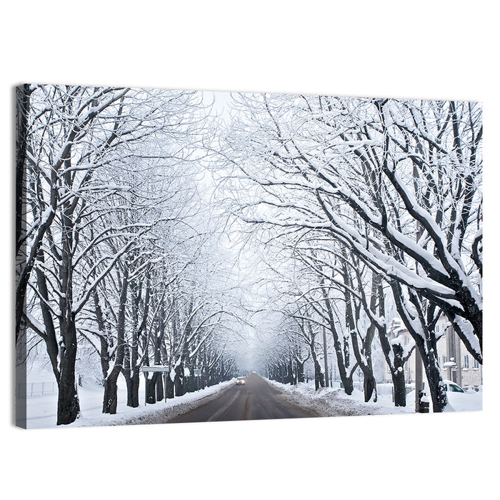Snowy Road with Distant Headlights Wall Art as a canvas print