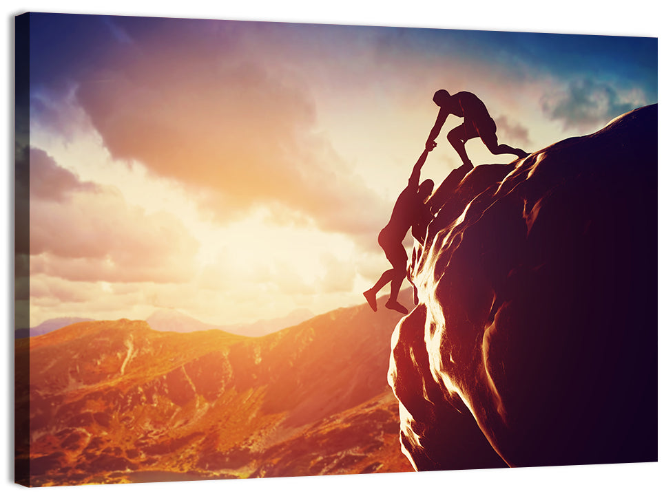 Two Hikers Summit Assist at Sunset Wall Art