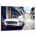 Vintage Car on Cobblestone Street Wall Art