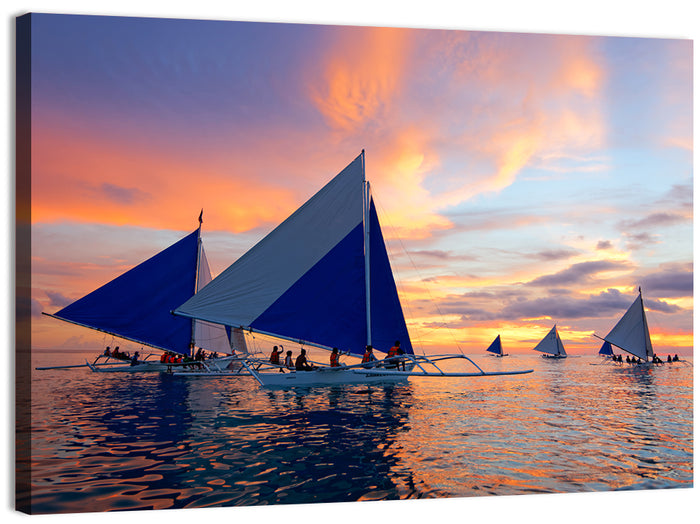 Outrigger Sailboats at Sunset Wall Art as a canvas print