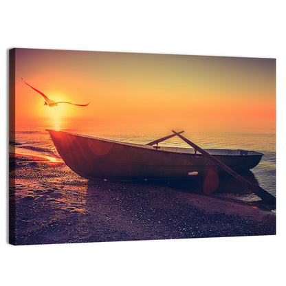 Sunset Rowboat on Sandy Shore Wall Art