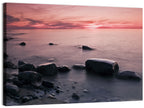 Pink Dusk Lakeshore with Silhouetted Rocks Wall Art