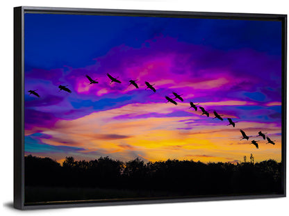 Silhouetted Cranes at Dusk Wall Art