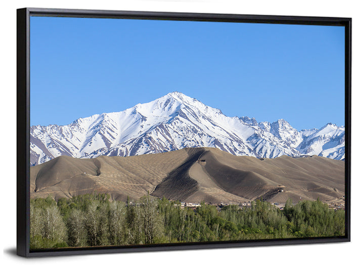 Afghan Snow-capped Peaks Above Forested Foothills Wall Art as a framed canvas